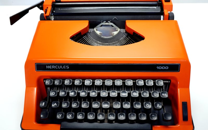 Retro Orange & Black Hercules Typewriter