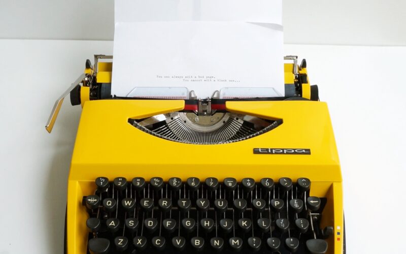 Yellow Triumph Tippa Typewriter