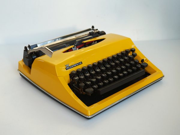 Yellow contessa deluxe typewriter