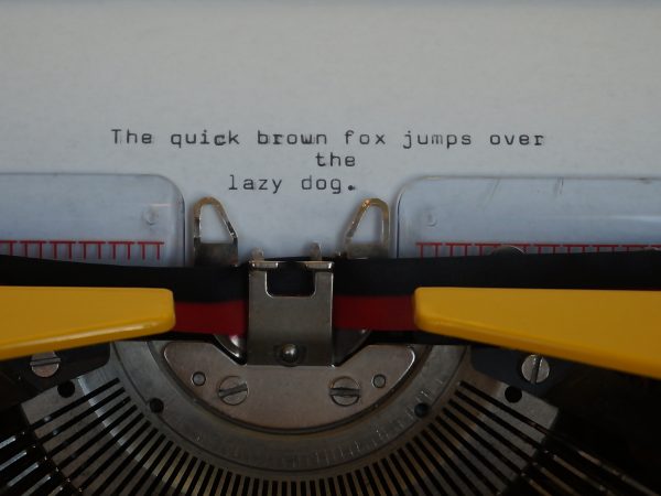 Yellow contessa deluxe typewriter