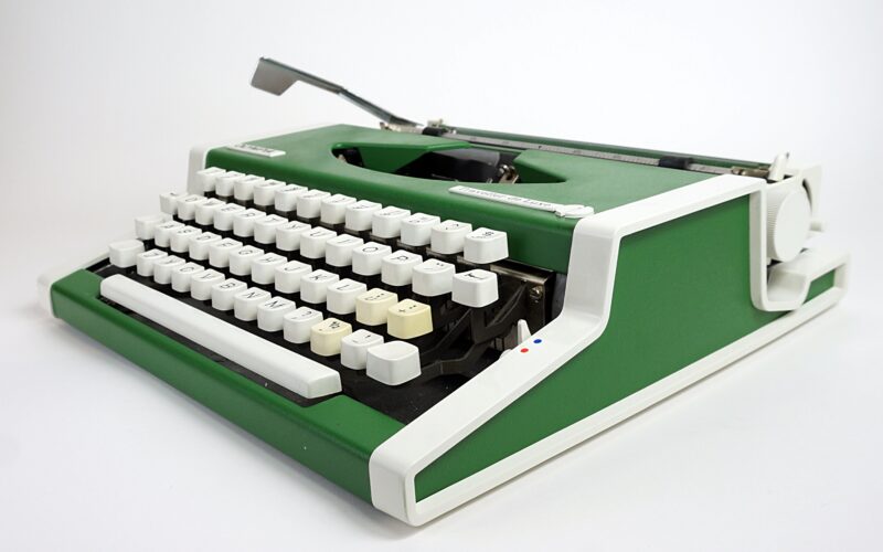Green Olympia Traveller deLuxe Typewriter