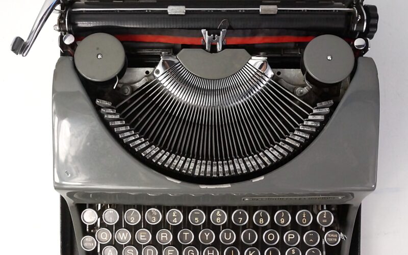 Grey Olivetti MP1 Invicta Typewriter