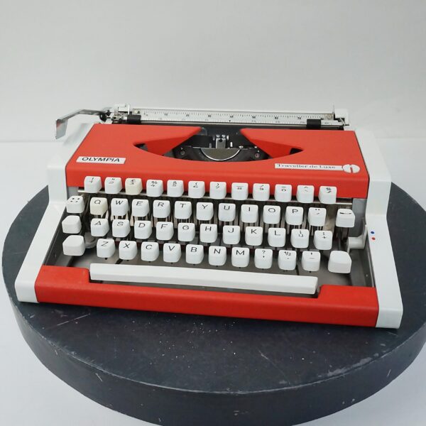 Orange Olympia traveller typewriter