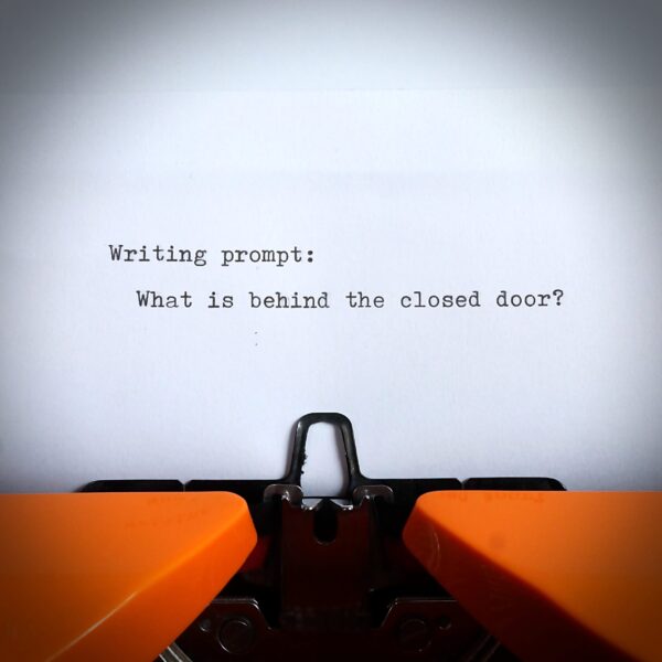 Orange triumph junior typewriter