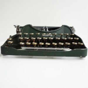 Green Masspro portable typewriter from 1932